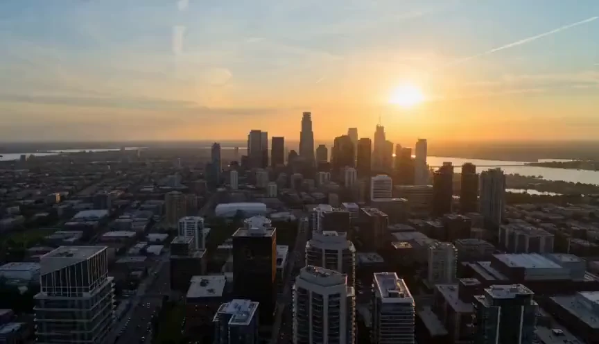 Seedance AI video example — a golden-hour aerial flyover of a city skyline at sunset